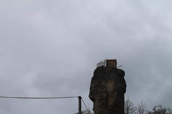 Chiatura. Soviet Past in the present. + Katskhi pillar - Katskhi Pillar and the monastery above