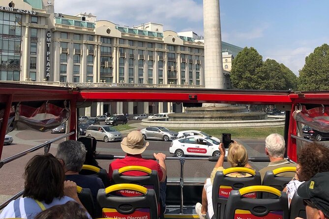 City tour Tbilisi on red bus - The audio guide and the human staff
