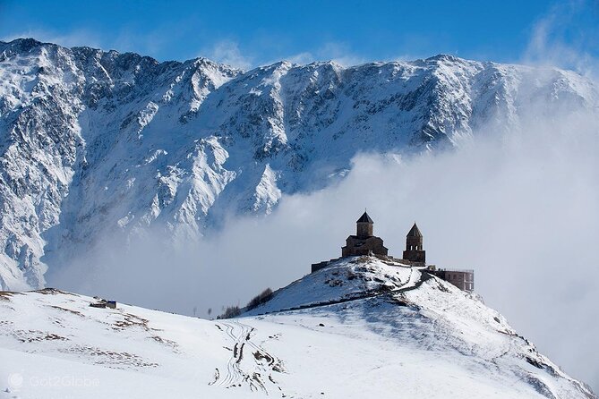 Discover the Majestic Georgian Highlands - Ananuri Fortress: stone towers above the reservoir
