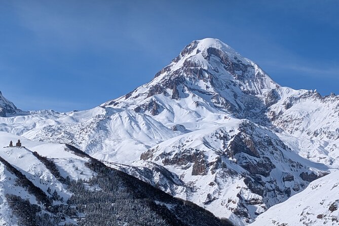 Kazbegi Gudauri and Ananuri Mountains Private Day Trip - Gergeti Trinity Church above Kazbegi