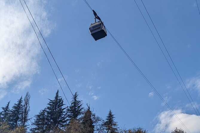 Kutaisi: Chiatura Cable Cars & Katskhi Pillar Guided Tour - Walking through Chiatura’s old station area