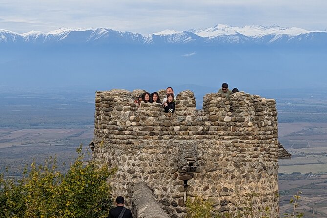 Private Kakheti Tour organic Wine Tasting with Lunch - Badiauri brings out hot bread and local cheese