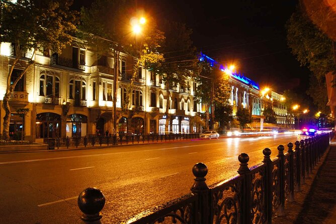 Tbilisi:Evening Walking & Talking Tour with Wine & Boat Ride - The Gabriadze clock tower and Georgian theater