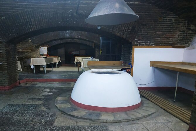 Tbilisi Walking Tour with Cable Car, Wine Tasting & Bread Bite - Two compact church visits with big stories